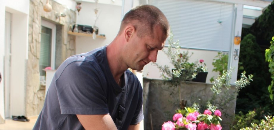 Tiler's assistant Vasyl Prokopovych on the construction site.