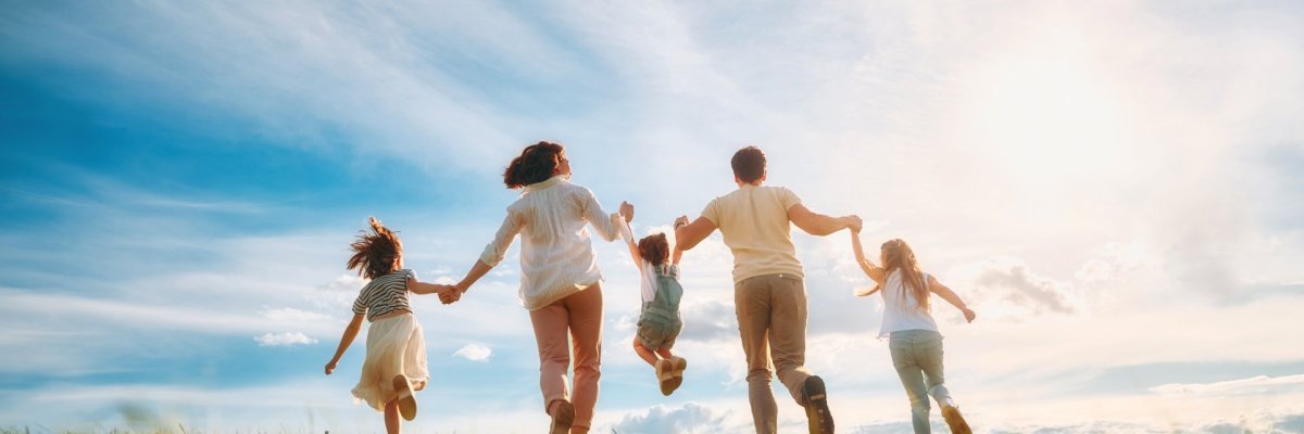 Happy family on summer walk